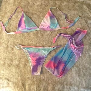 Size Small tie-dye woman’s string bikini with matching waist wrap